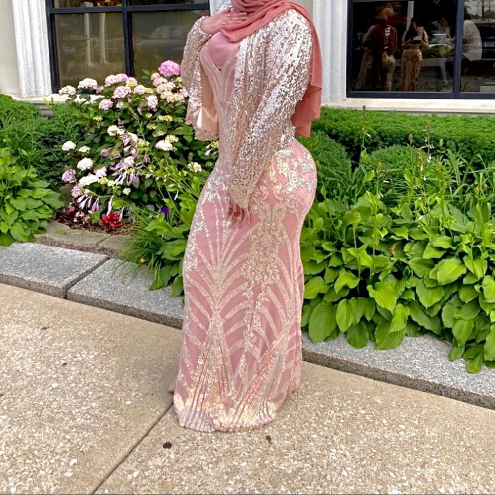 Beautiful iridescent maxi dress. Worn a few times. Used. Prom dress. Sparkly.